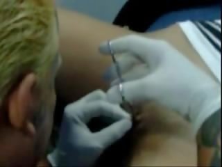 Body piercing of clit
